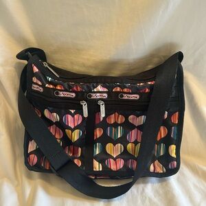 LeSportsac Large Black Nylon Crossbody Bag with Multicolor Heart Print